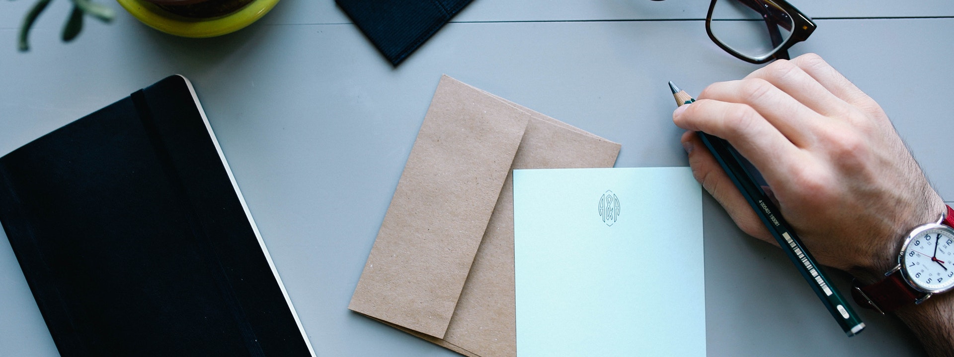 Hand and piece of paper